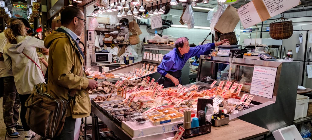 A food vendor in Kyoto Japan Nishiki Market